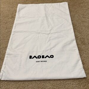 Issey Miyake White Bag with Black Logo